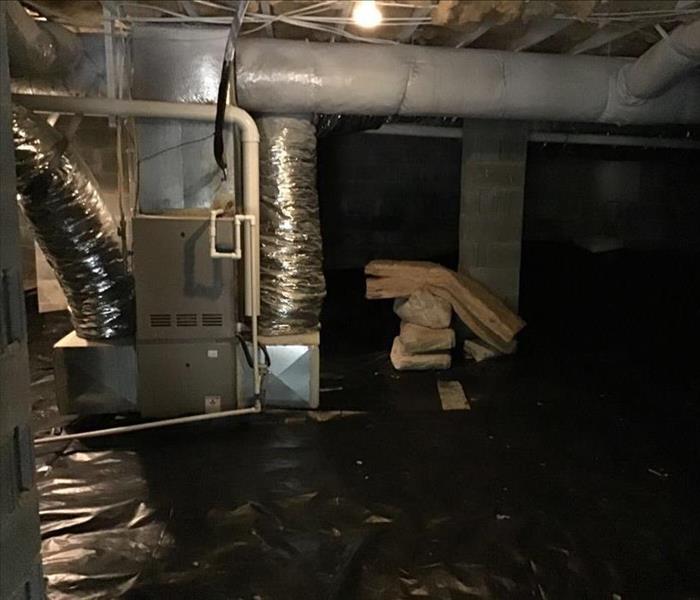 Crawl space after being cleaned and sealed 